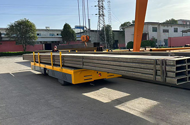 steerable transfer cart for handling steel structure
