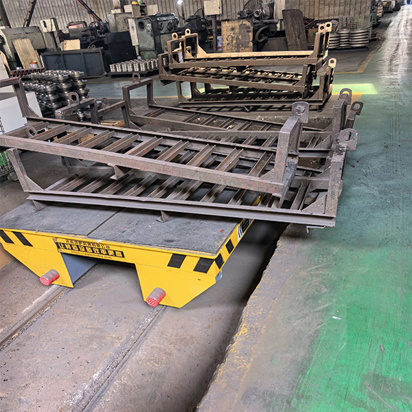 Their workshop already had existing 1.5-meter gauge tracks. Re-laying the tracks would be expensive and disruptive to production. After understanding their situation, we customized this 10-ton Rail Transfer Cart for them. It perfectly fits the existing tracks and can be used immediately without any modifications.